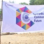 Commonwealth-day-banner-with-the-team-Toward-a-common-future