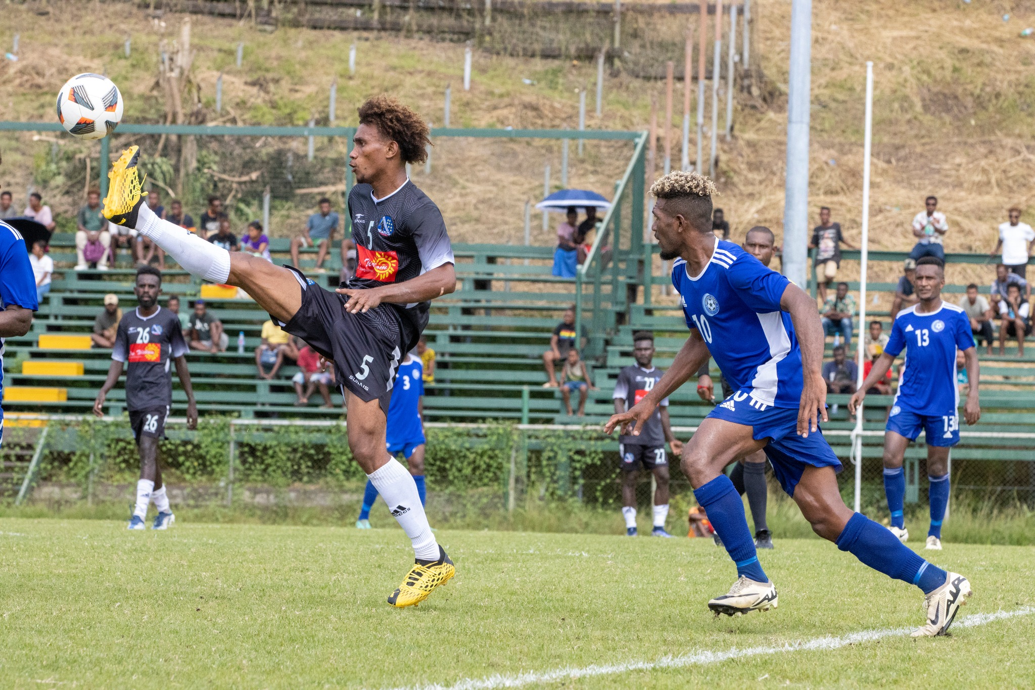 Action between Real Kakamora FC and Central Coast FC yesterday at Lawson Tama Stadium-PHOTO TSL