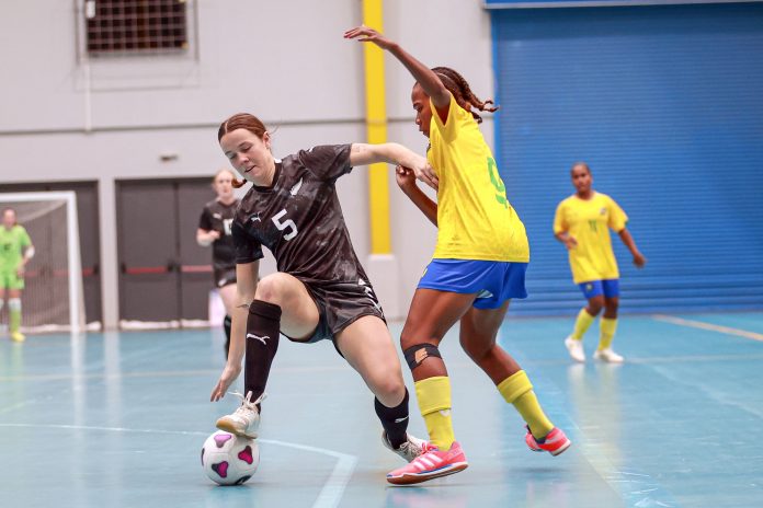 Action between New Zealand and Solomon Islands yesterday at the Friendship Hall