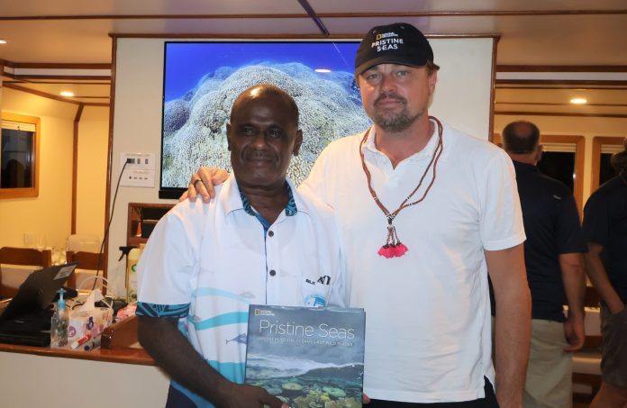 Prime Minister J. Manele and Ocean Conservation advocator and Hollywood star Leonardo DiCaprio onboard Research vessel ARGO.