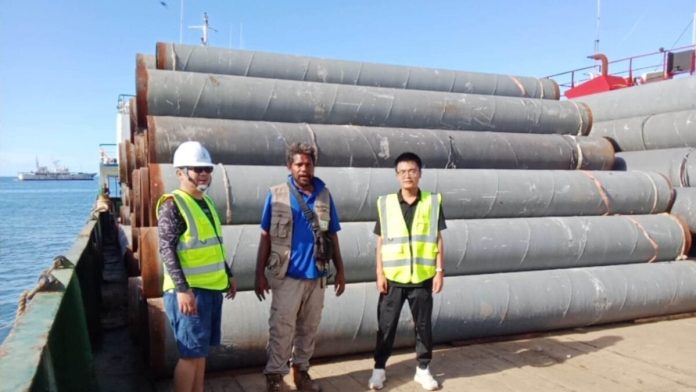 Shippment of first consignment of building materials for Ahanga wharf project on Bellona Island, Rennell Bellona province....Chinese Embassy Office Honiara