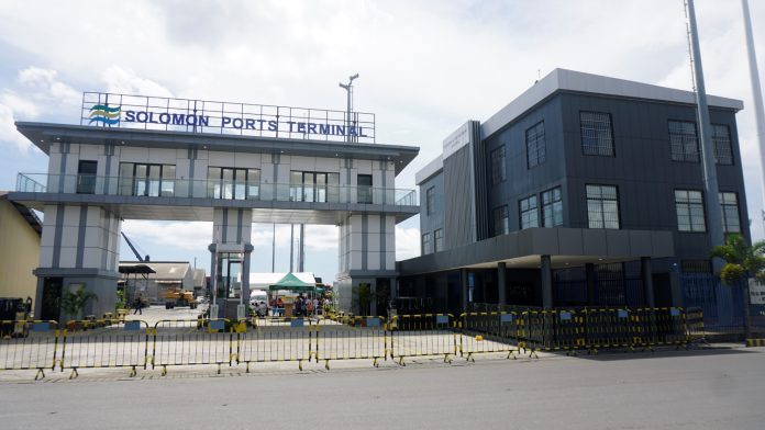 The New Port Terminal overhead gatehouse (left) and a pedestrian entry (right) for security screening before entering the port facilities