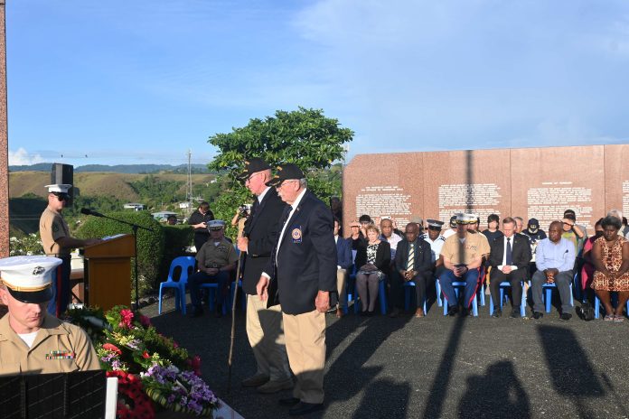 Two guests laid wreaths at the dawn ceremony.