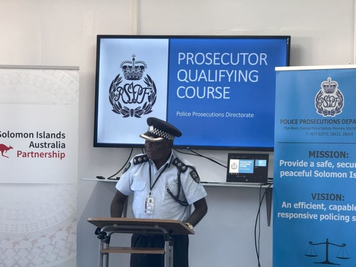 Inspector Rodney Wheatney, Director of Police Prosecution Department giving his remarks.