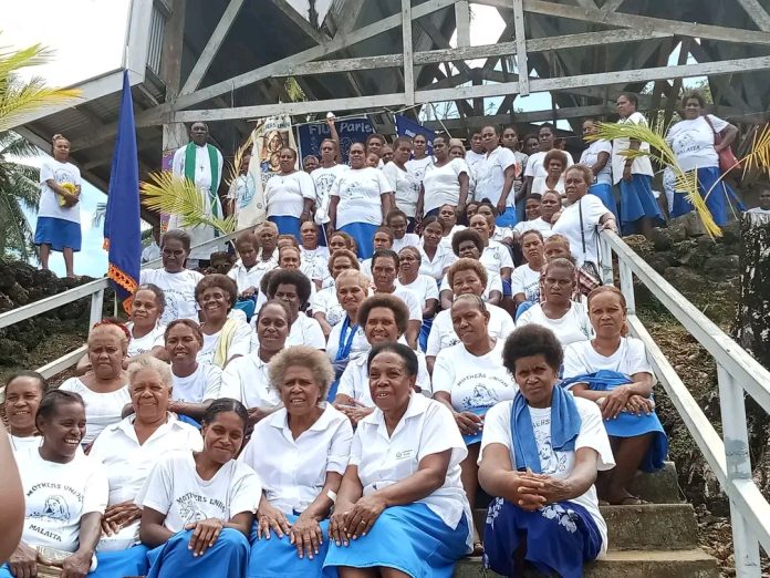 Mothers pose for a group photo