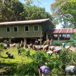 Communities clearing the area to make way for the new clinic building. Photo SEPI Forum.