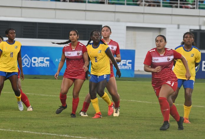 Ali Fuamatu-Ma'afala (in red at right side of picture), scorer of the lone goal that edged the hosts Solomon Islands. Photo credit. Tony Iroga