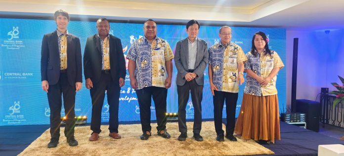 CBSI Governor Forau, with dignitiaries attending the forum.