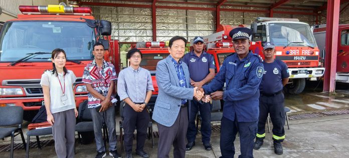 Director Supervising RSIPF Fire Service James Ketaru receiving the keys from Japanese Ambassador Keiichi Higuchi during the Handover ceremony.